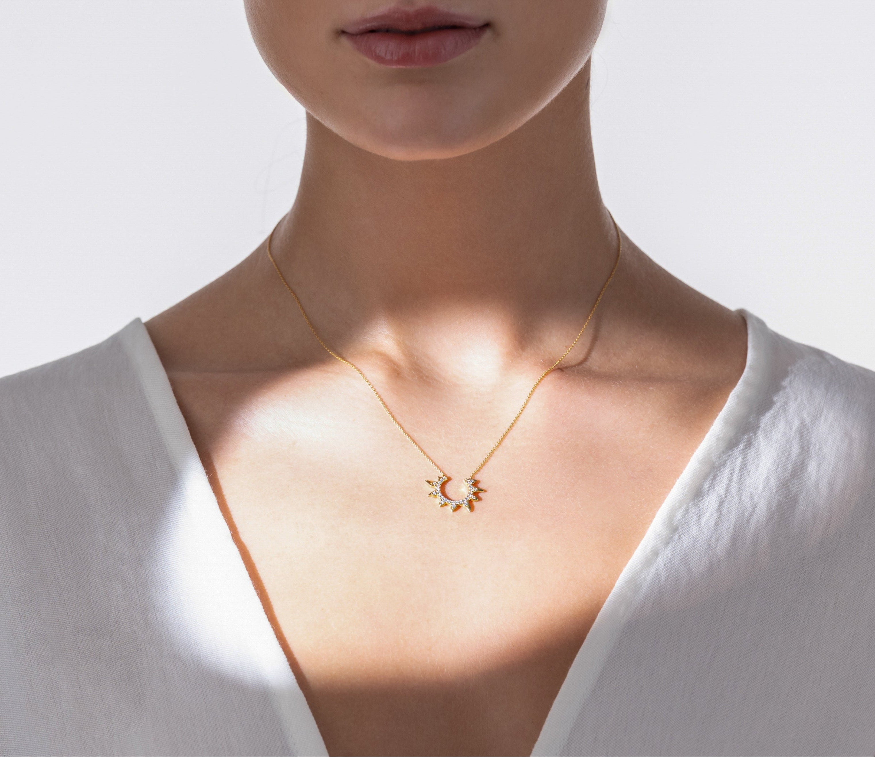 <tc>Κρεμαστό "Θεός Ήλιος" με Ζιργκον</tc>